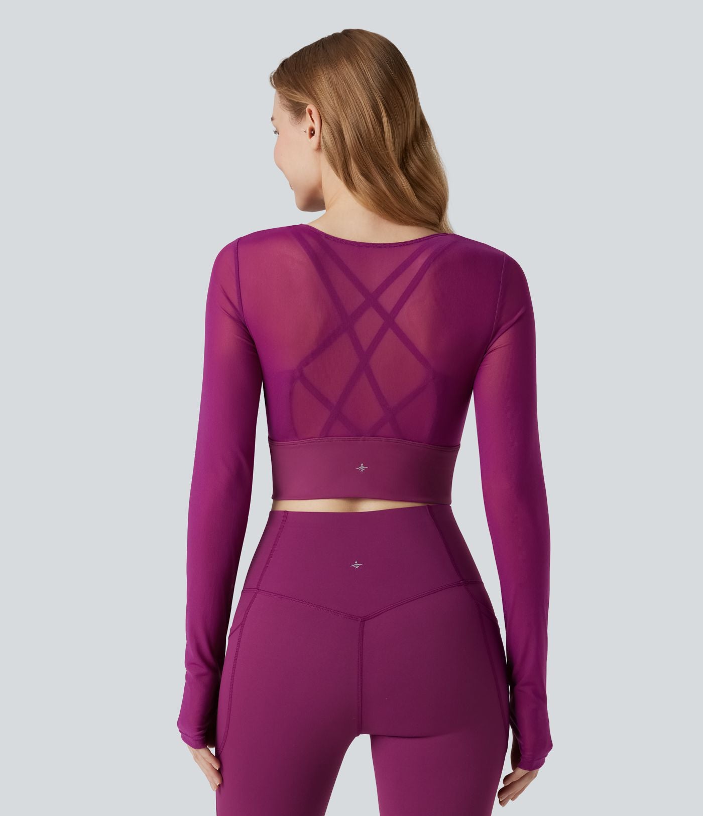 Haut de sport yoga cropped 2-en-1 manches longues mesh contrastant à trous pouces