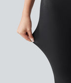 Leggings de yoga taille haute en maille côtelée avec imprimé métallisé et poches