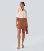 Blouse aspect lin col rond, manches mi-longues, boutonnée avec ourlet arrondi pour la détente