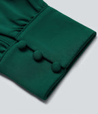 Combinaison tailleur col V manches longues bouffantes coupe droite avec poches