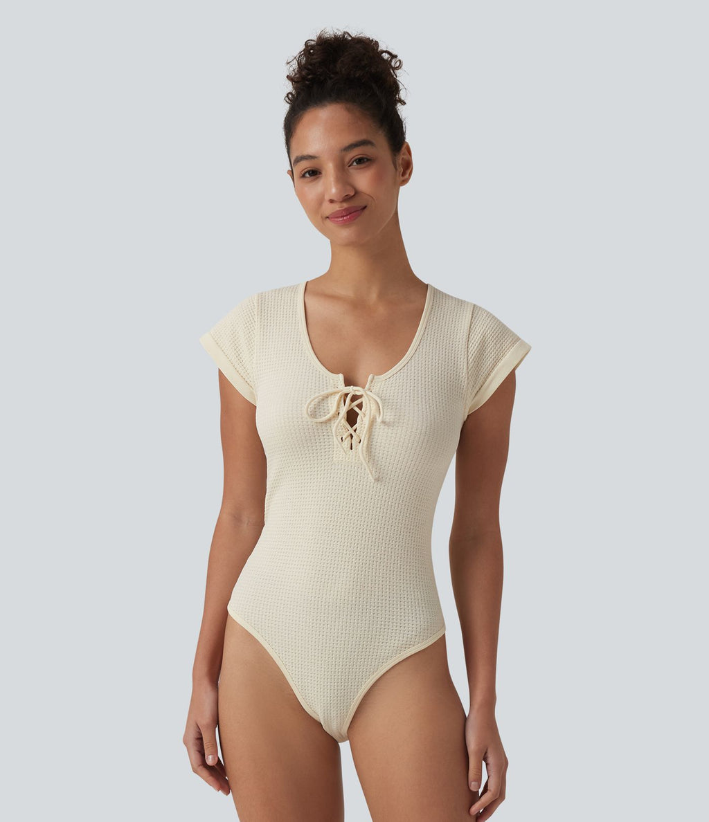 Body décontracté col rond à lacets manches courtes boutons-pression tissu gaufré