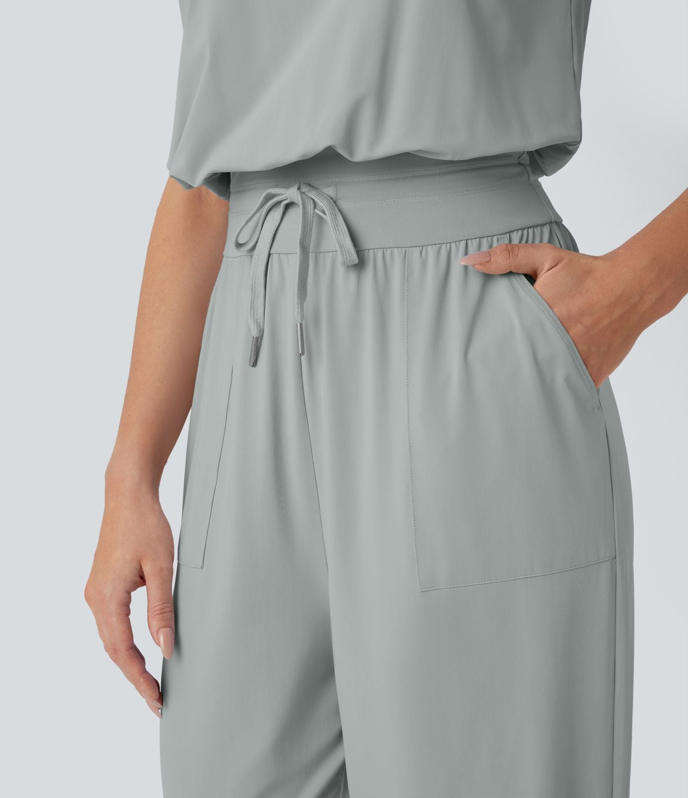Combinaison de yoga col bateau sans manches dos nu avec découpes et poches latérales à cordon de serrage effet frais InstantCool, protection solaire UPF50+