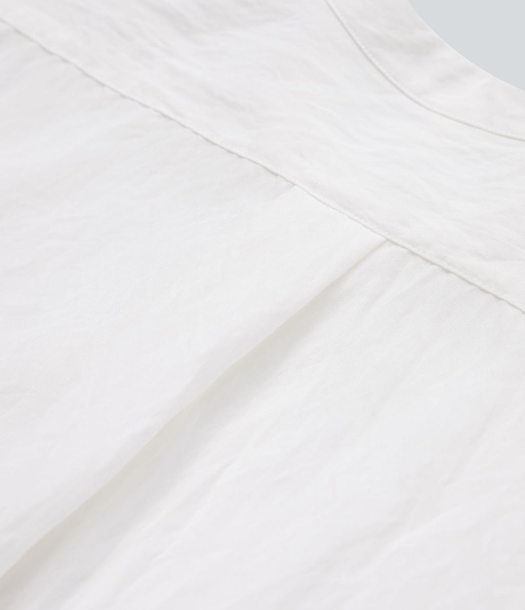 Chemise décontractée manches longues ourlet arrondi avec poche