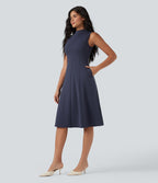 Robe mi-longue col montant sans manches avec poches