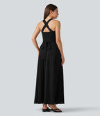 Robe longue fluide décontractée sans manches décolleté en cœur bretelles croisées avec lien dans le dos et poches