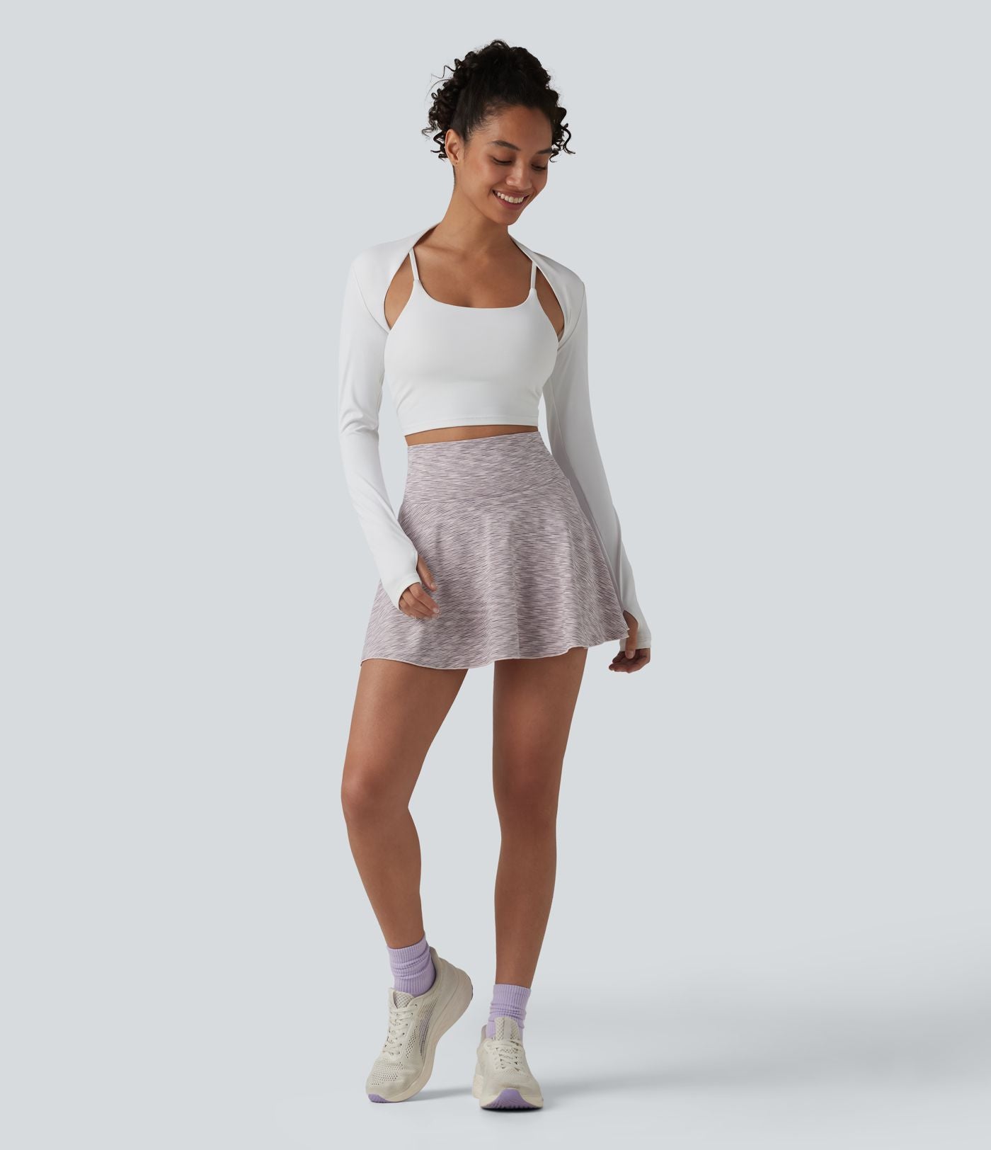 Jupe de sport mini gainante 2-en-1 taille haute à rayures avec poches