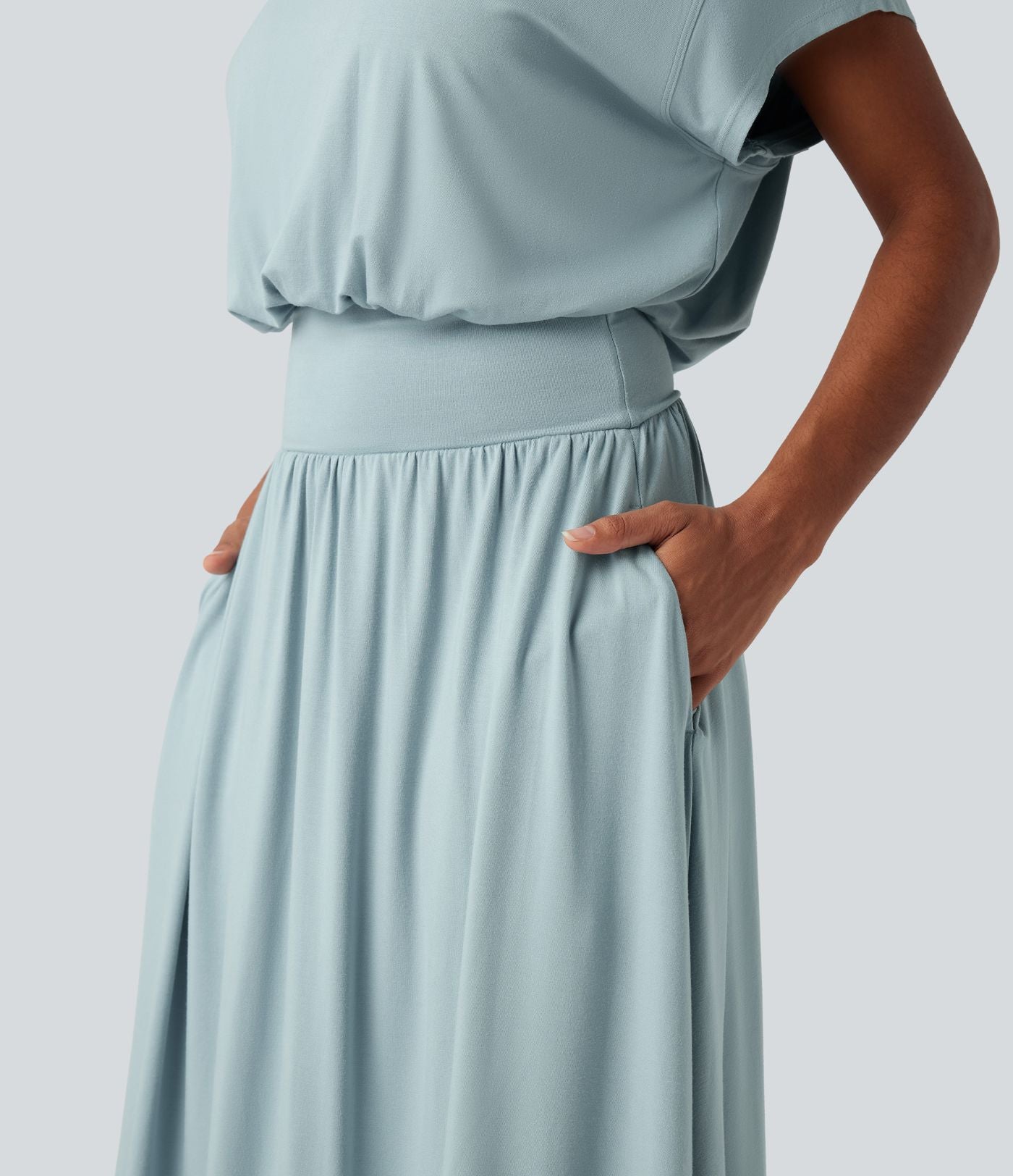 Robe de travail mi-longue fluide gainante à manches chauve-souris avec poches
