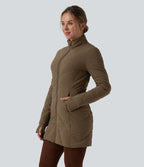 Doudoune PuffFlex col montant double zip avec passants pouces avec poches