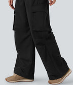 Pantalon cargo décontracté à taille moyenne, jambes larges, boutons, fermeture éclair et poches latérales