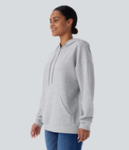 Sweat-shirt décontracté à capuche avec cordon de serrage, manches longues, poche kangourou, coupe croisée et fente