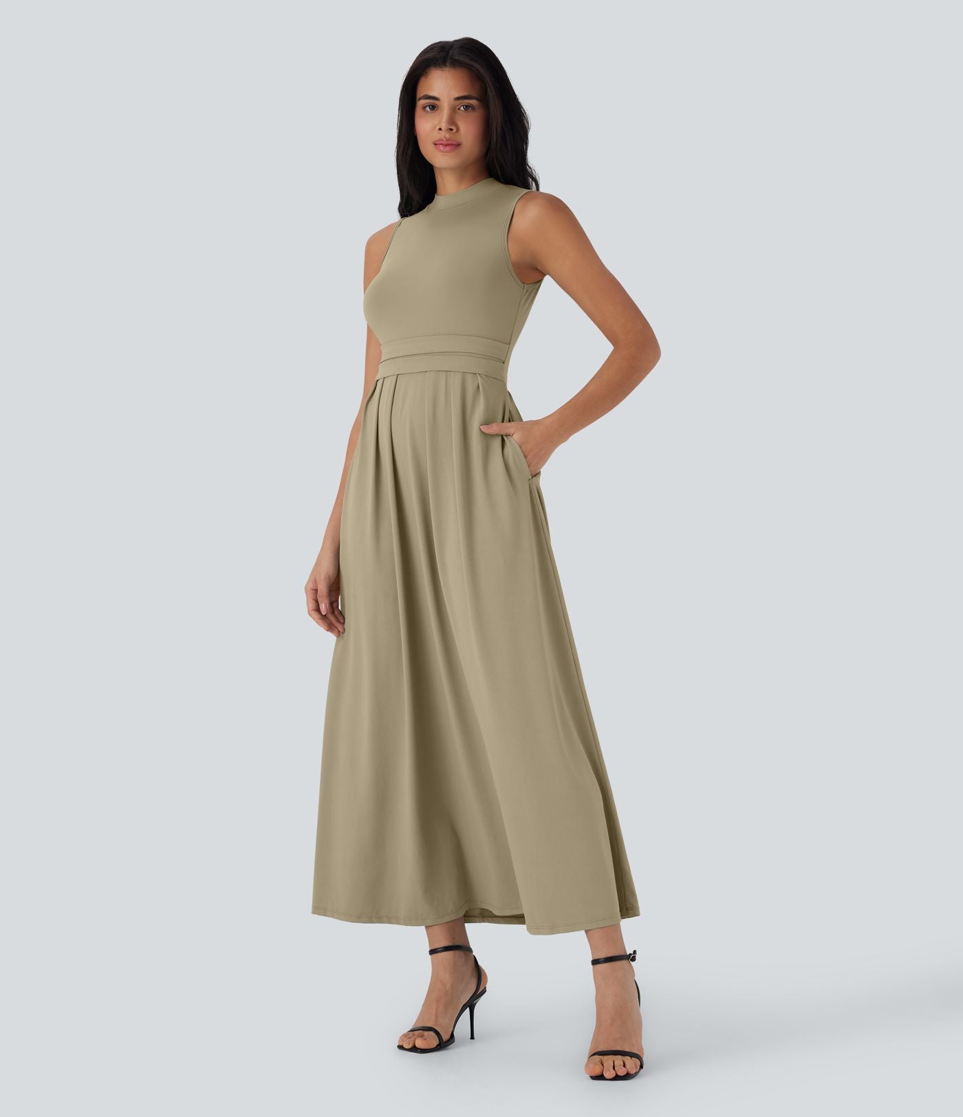 Robe longue décontractée sans manches à col montant, coupe évasée et poches latérales