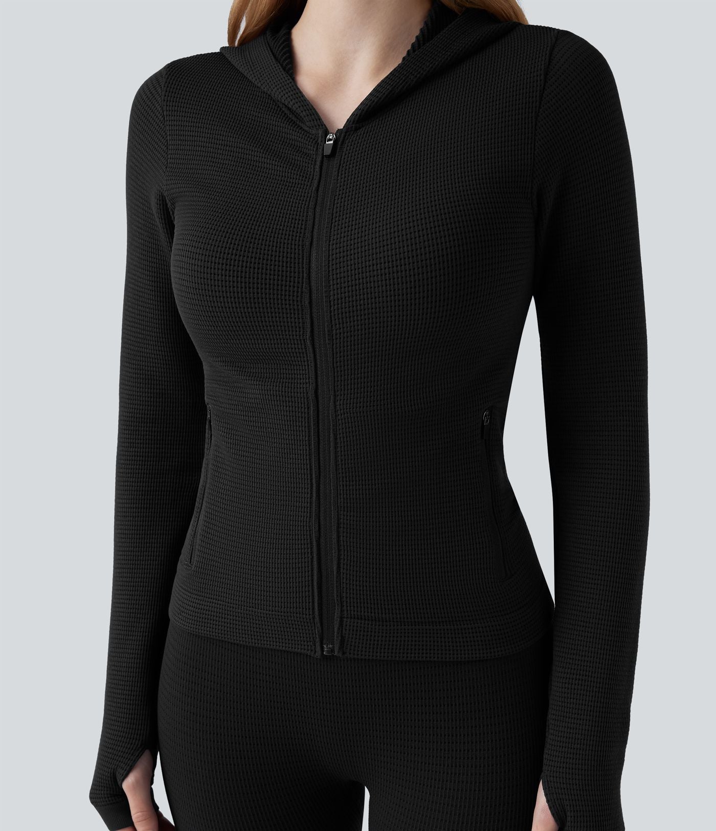 Veste yoga en maille gaufrée à capuche zippée à manches longues avec passants pouces sans couture OneForm Seamless Flow avec poches