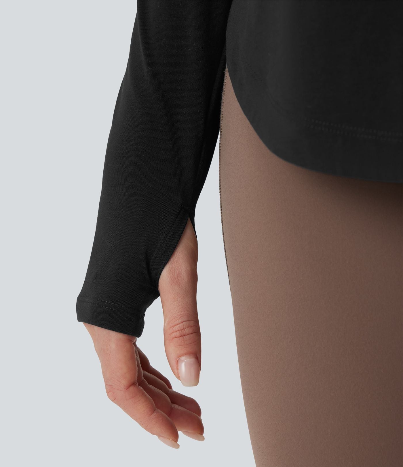 Top yoga sport séchage rapide une épaule manches longues trous pouces ourlet arrondi haut-bas