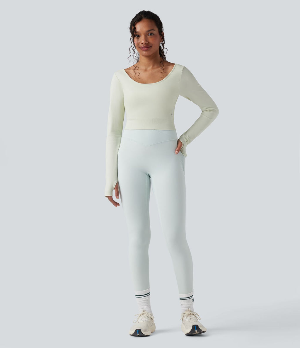 Haut de sport de yoga court Seamless Flow dos nu torsadé encolure dégagée manches longues avec passants pouces