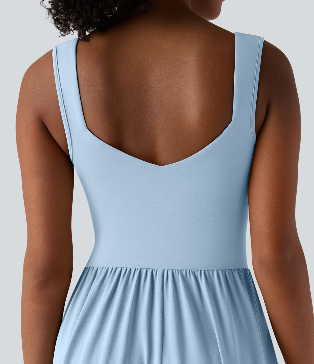 Robe midi fluide sans manches dos croisé ouvert avec poches