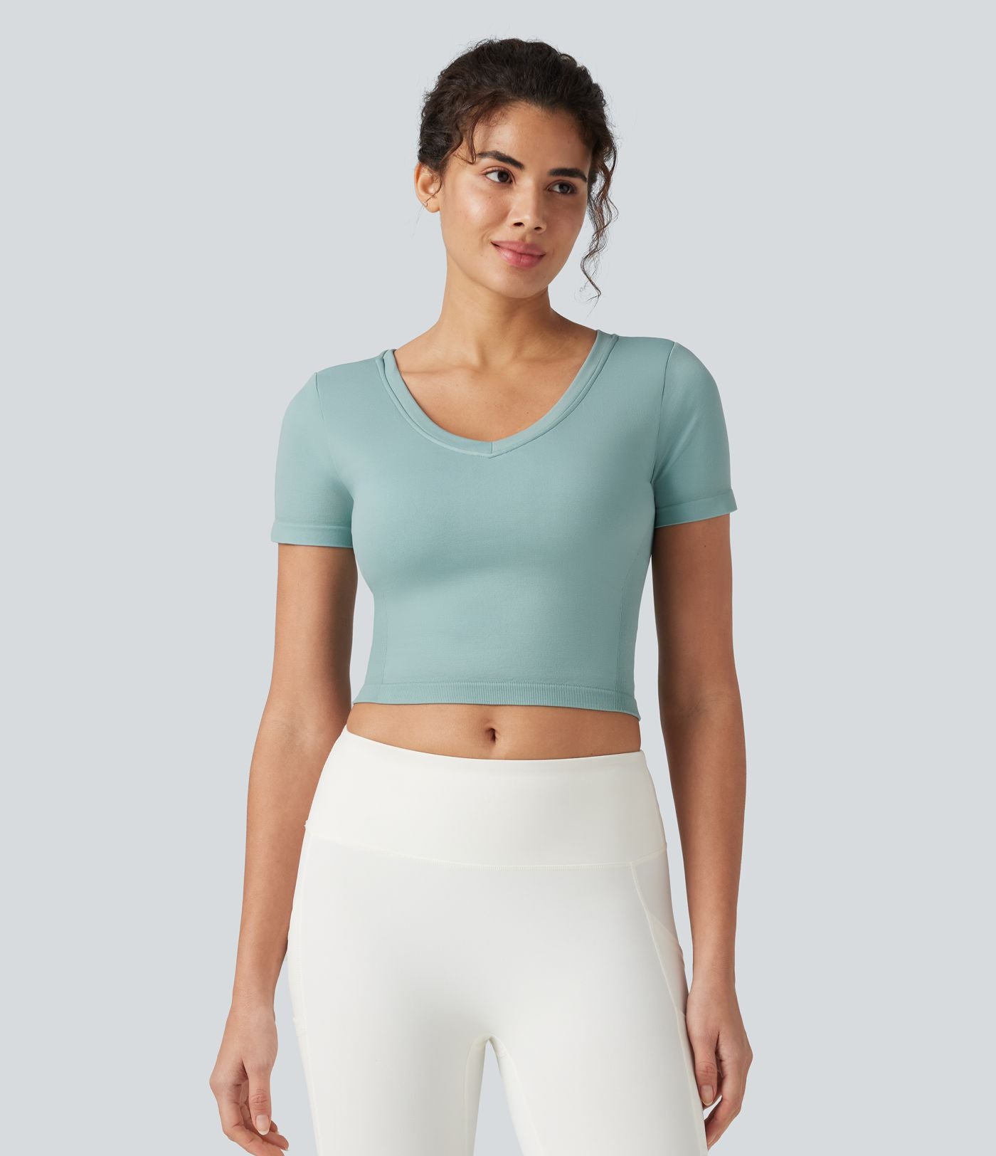 Haut de yoga court OneForm Seamless Flow col V à manches courtes avec brassière intégrée