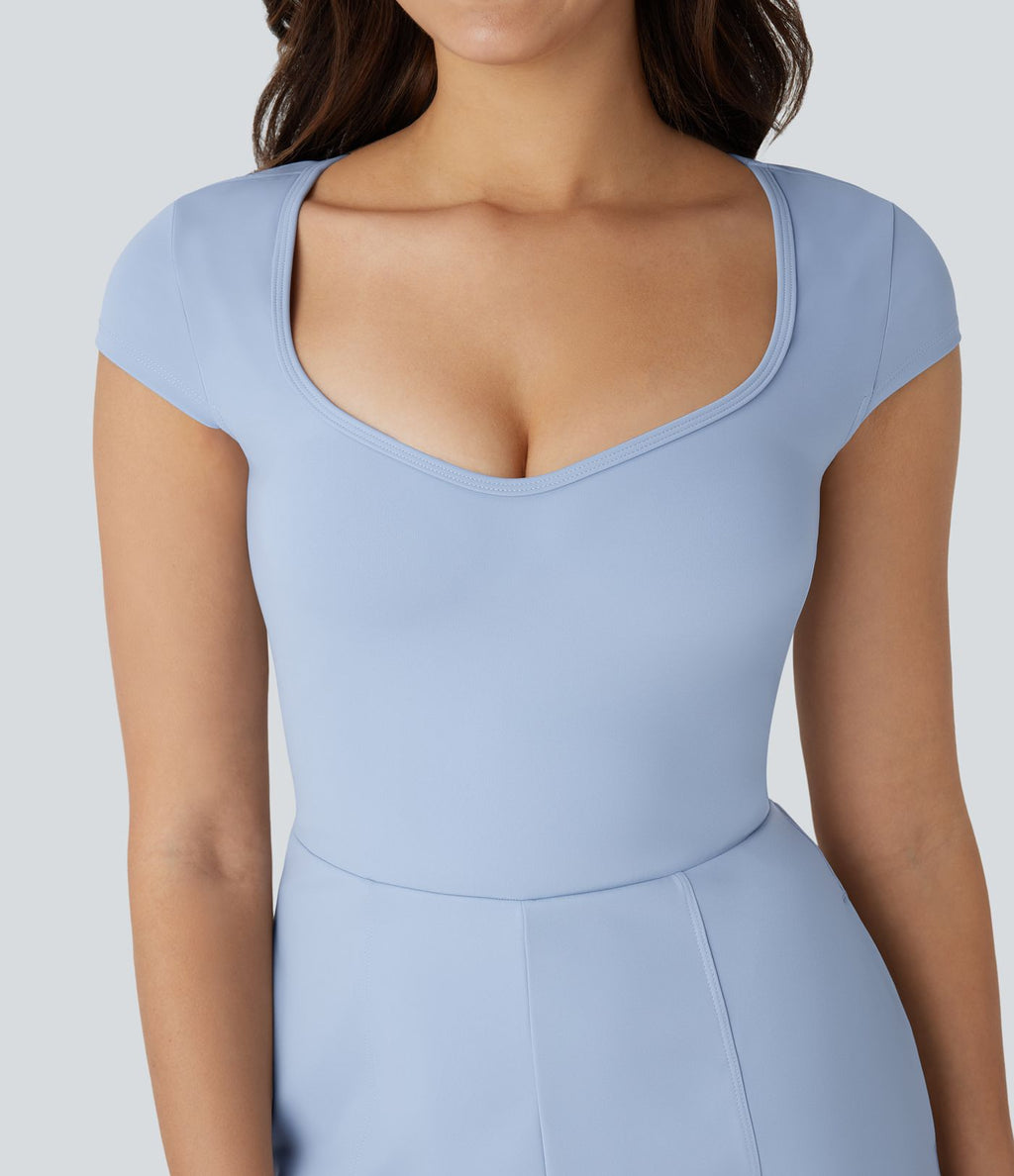 Combinaison de yoga Softlyzero™ Airy avec col U, manches courtes et poches latérales - Édition Easy Peasy