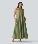 Robe débardeur midi unie sans manches à col rond et poches