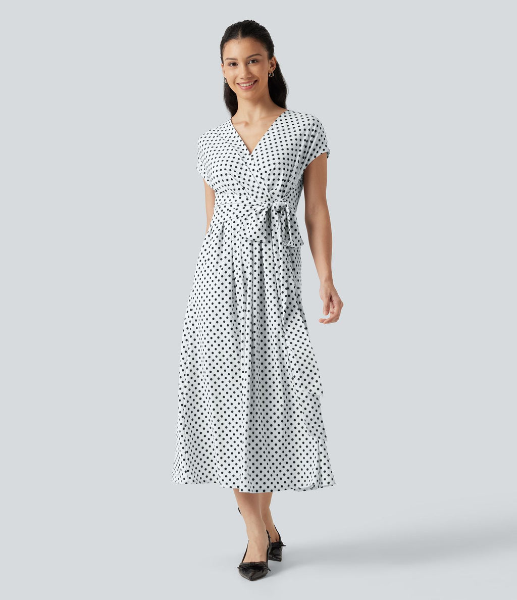 Robe midi à pois col V avec manches courtes, lien côté et poches