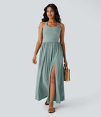 Robe longue fluide fendue avec poches latérales, dos nu et effet torsadé