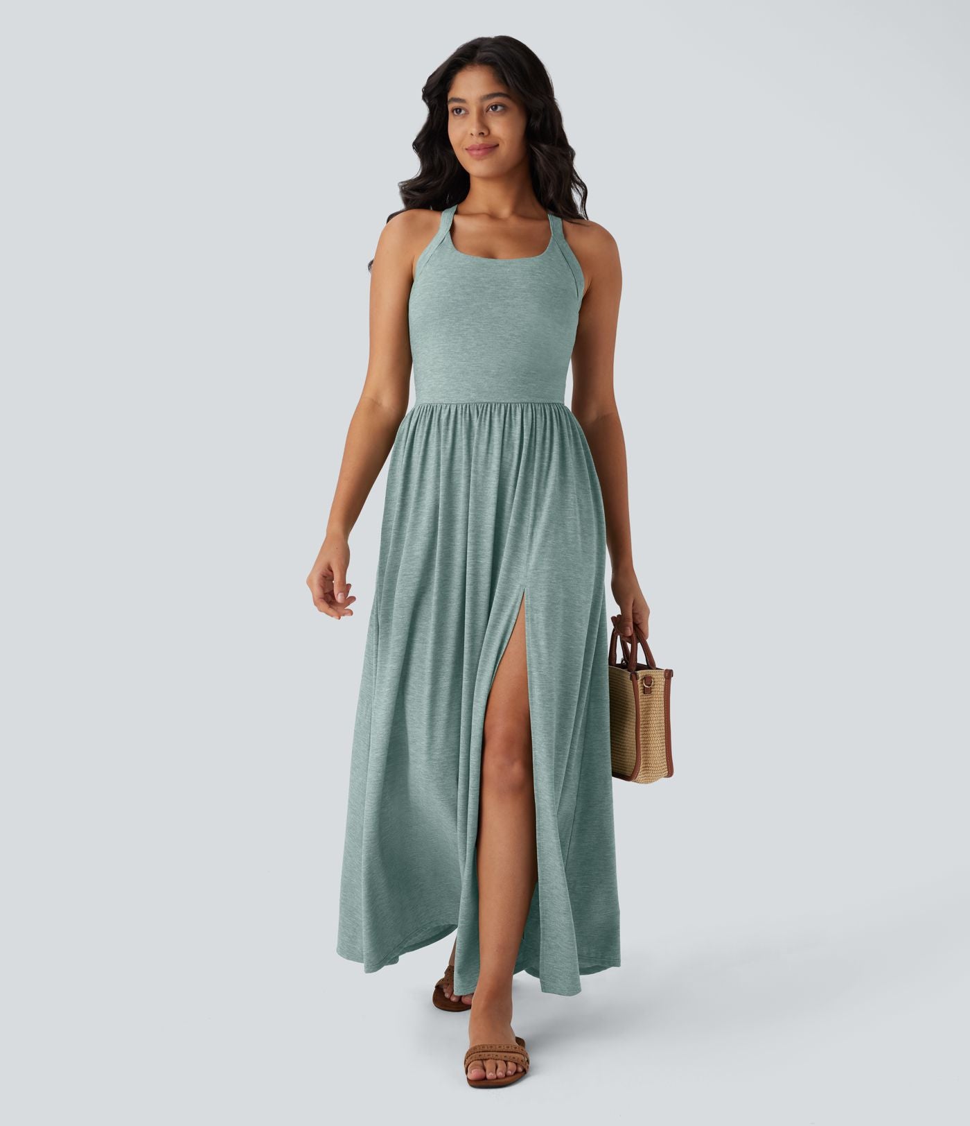 Robe longue fluide fendue avec poches latérales, dos nu et effet torsadé