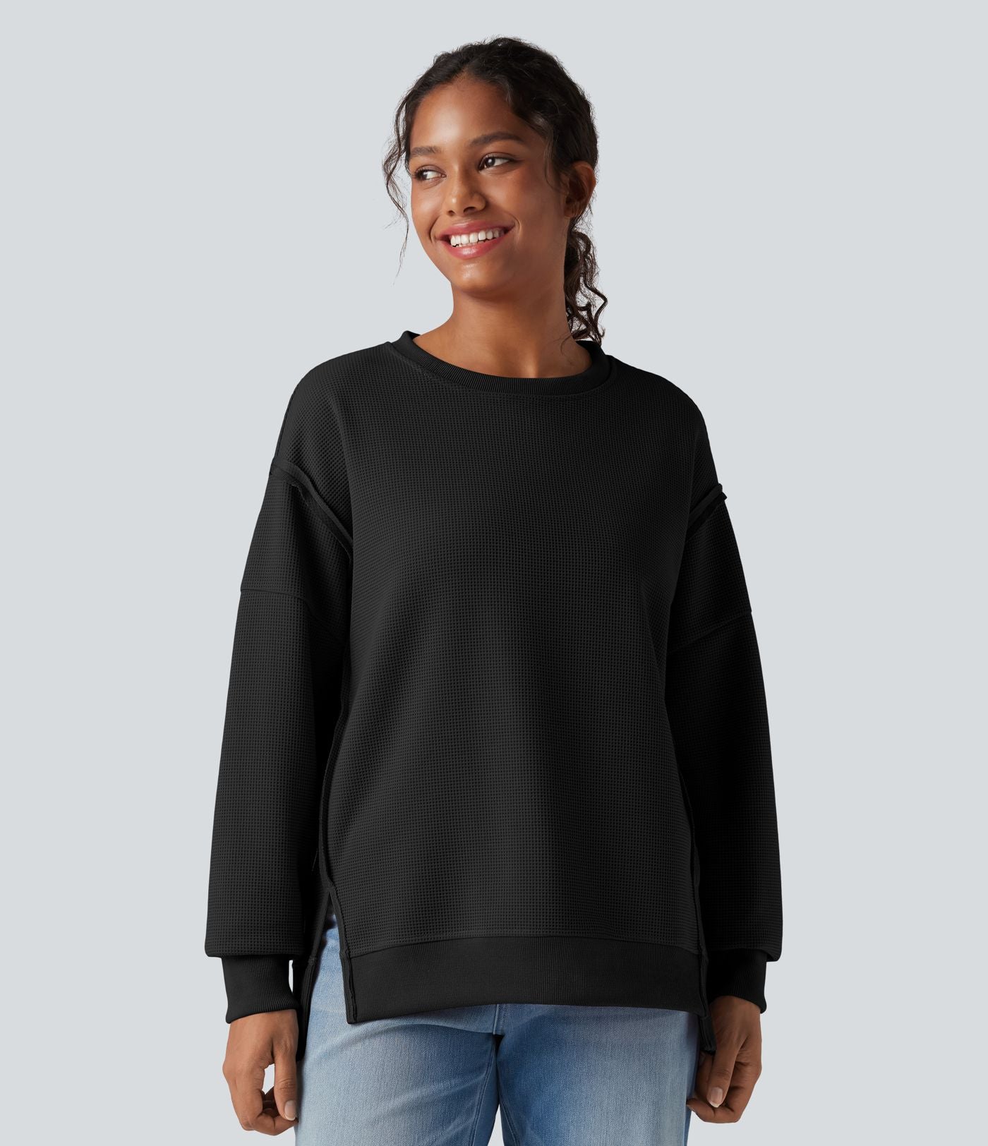 Sweat-shirt gaufré col rond ourlet fendu manches longues