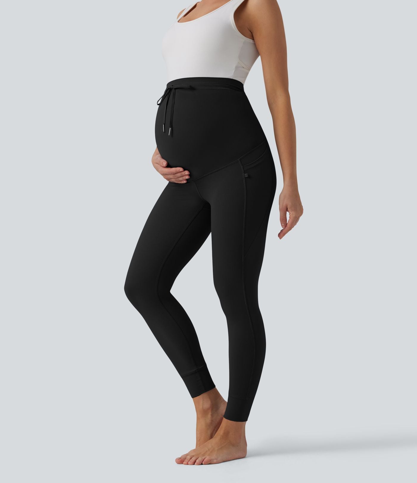 Halara UltraSculpt™ Legging yoga maternité 7/8 uni taille ultra haute à cordon de serrage avec poches