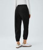 Pantalon décontracté en velours côtelé avec taille mi-haute, boutons et fermeture éclair