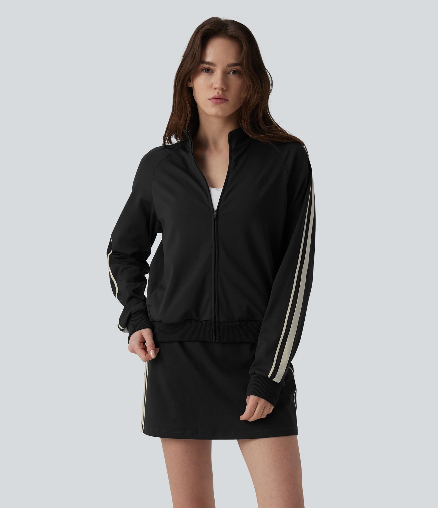 Veste de sport DayStretch col montant color block à rayures avec poches