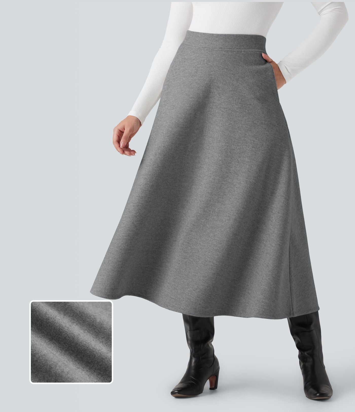 Jupe mi-longue évasée polaire taille haute avec poches