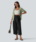 Pantalon casual court en coton et lin taille haute coupe ballon avec cordon de serrage et poches