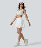 Jupe-short de tennis mini taille haute croisée fluide avec poches