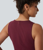 Robe tailleur mini sans manches à col rond froncée avec poches