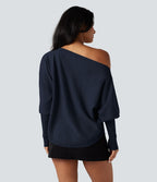 Pull une épaule manches chauve-souris ourlet arrondi