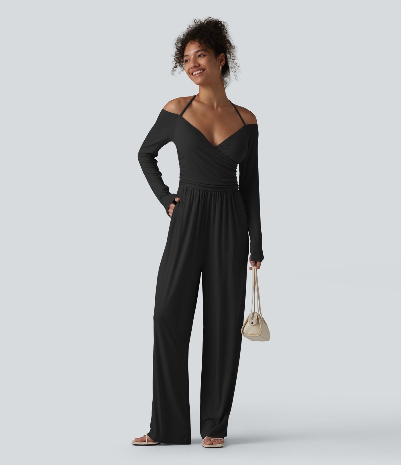 Combinaison casual en maille côtelée dos nu noué épaules dénudées manches longues avec soutien-gorge intégré et poches