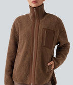 Veste de sport sherpa à manches longues avec ourlet asymétrique arrondi et poches