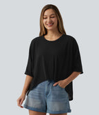 T-shirt décontracté col rond manches mi-longues ourlet asymétrique