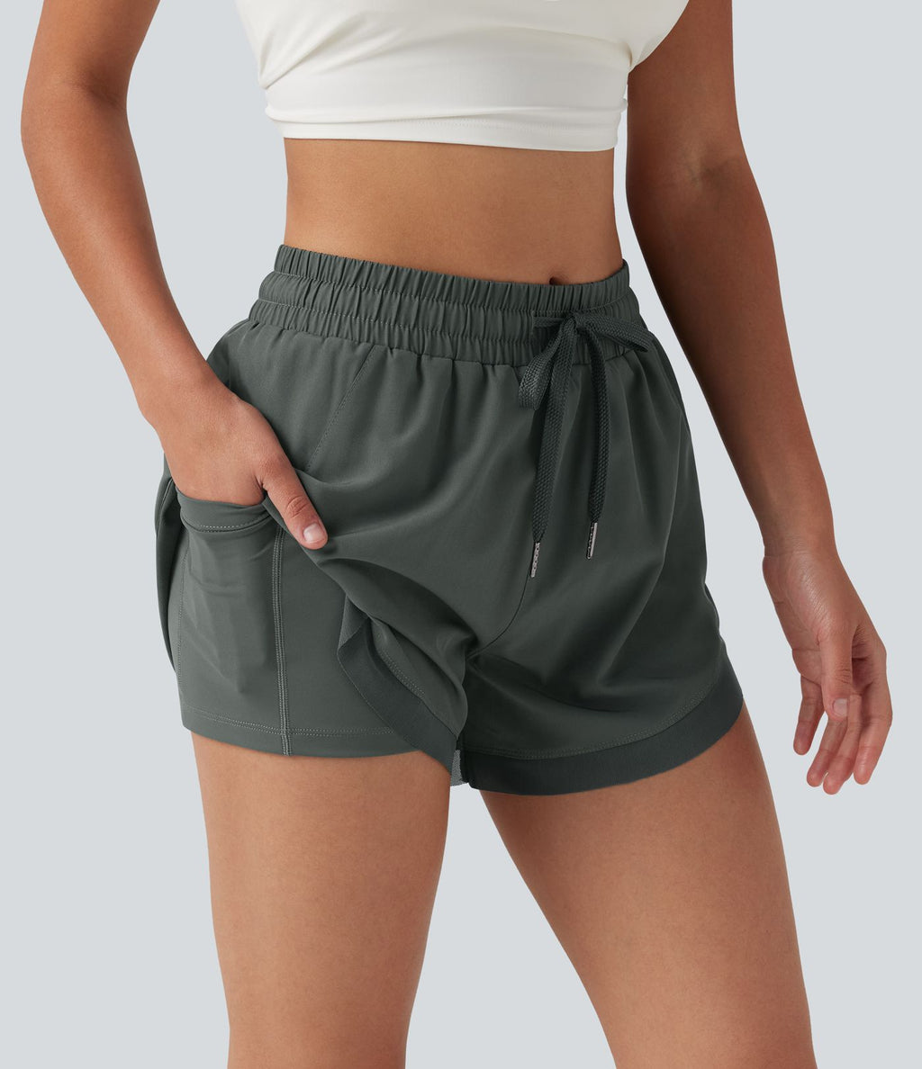 Short de running 2-en-1 taille mi-haute 7,5 cm avec cordon, ourlet incurvé, mesh contrasté et poches