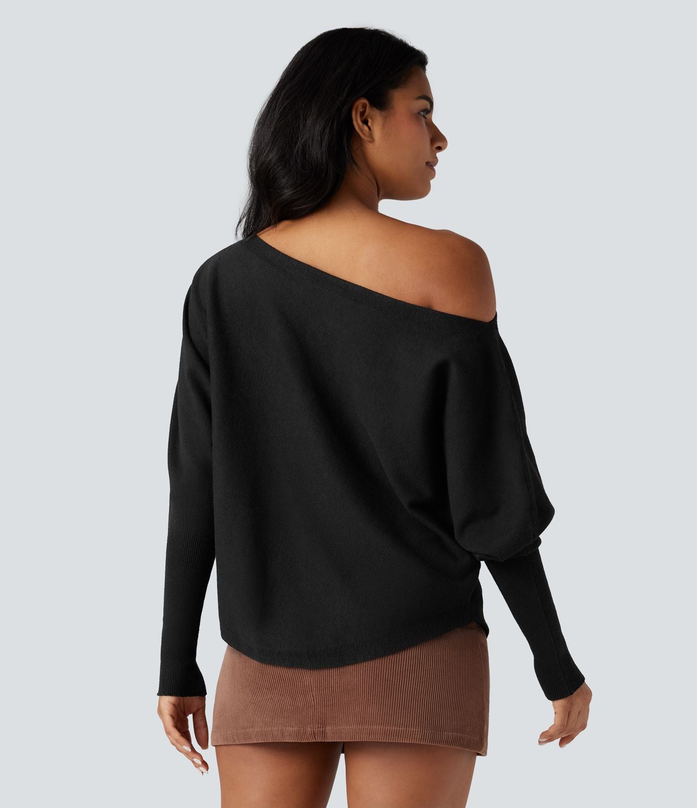 Pull une épaule manches chauve-souris ourlet arrondi