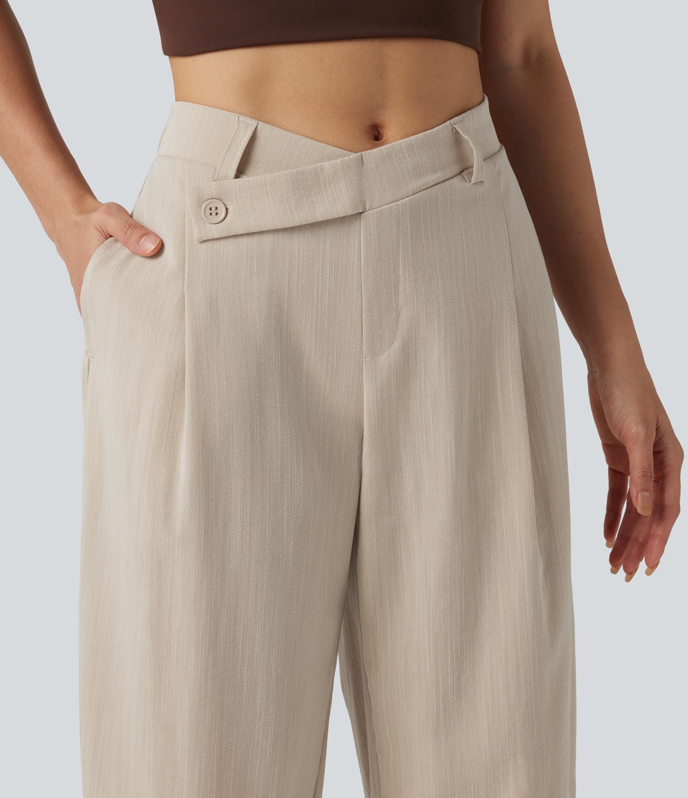 Pantalon tailleur asymétrique effet lin, taille moyenne, coupe ballon, à poches