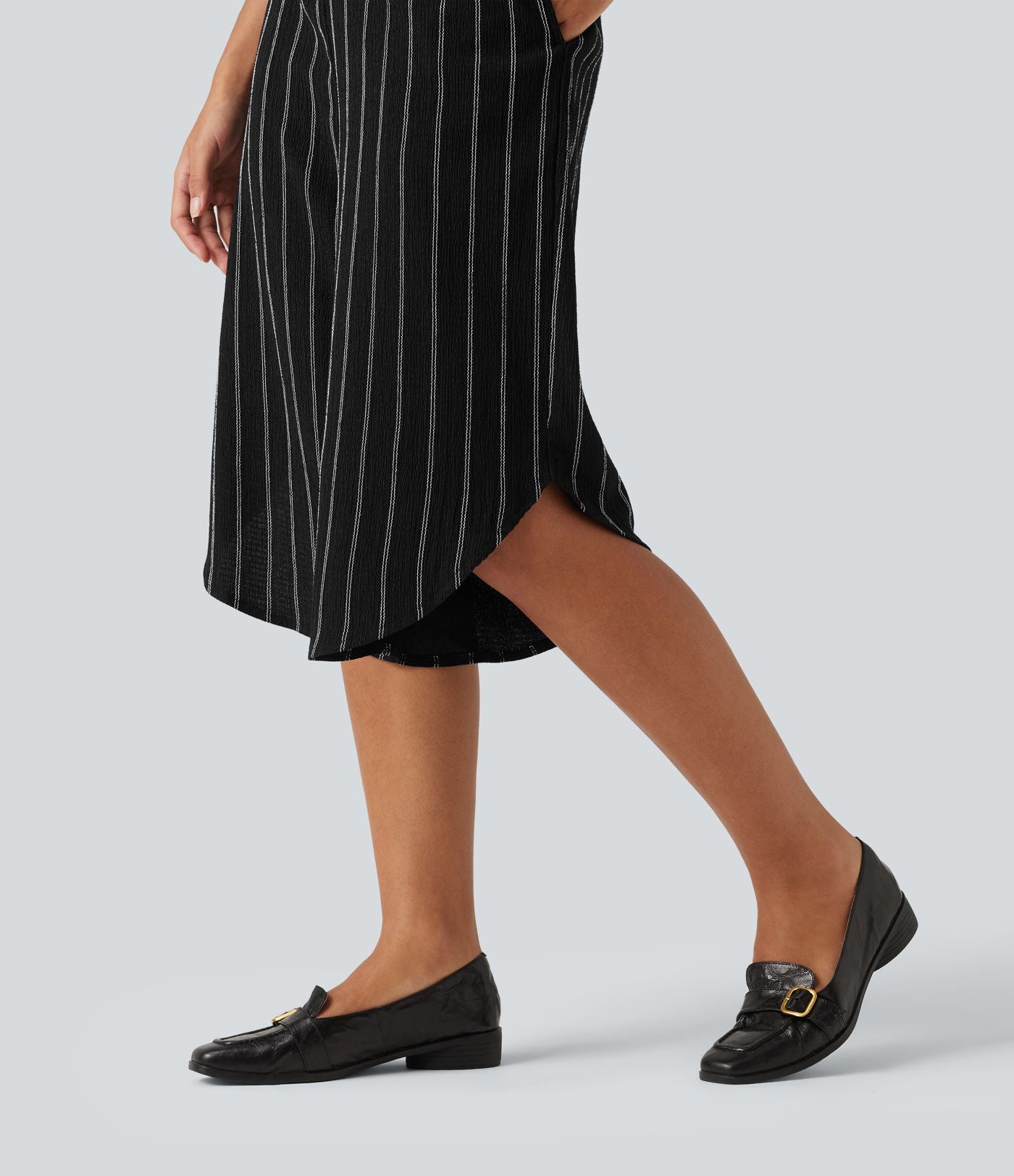 Pantacourt rayé taille haute avec ourlet arrondi et poches