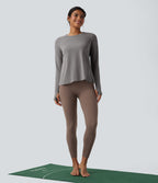 Haut de sport yoga dos nu manches longues avec trous pouces