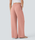 Pantalon large fluide taille haute avec cordon de serrage, poches latérales et aspect lin
