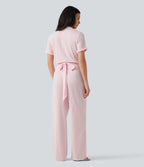 Combinaison-chemise accès facile Easy Peasy en coton froissé rayé à manches courtes, cache-cœur, lien au dos et poches