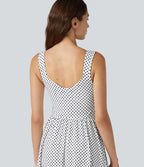 Robe fluide décontractée midi sans manches dos nu croisée à pois avec poches