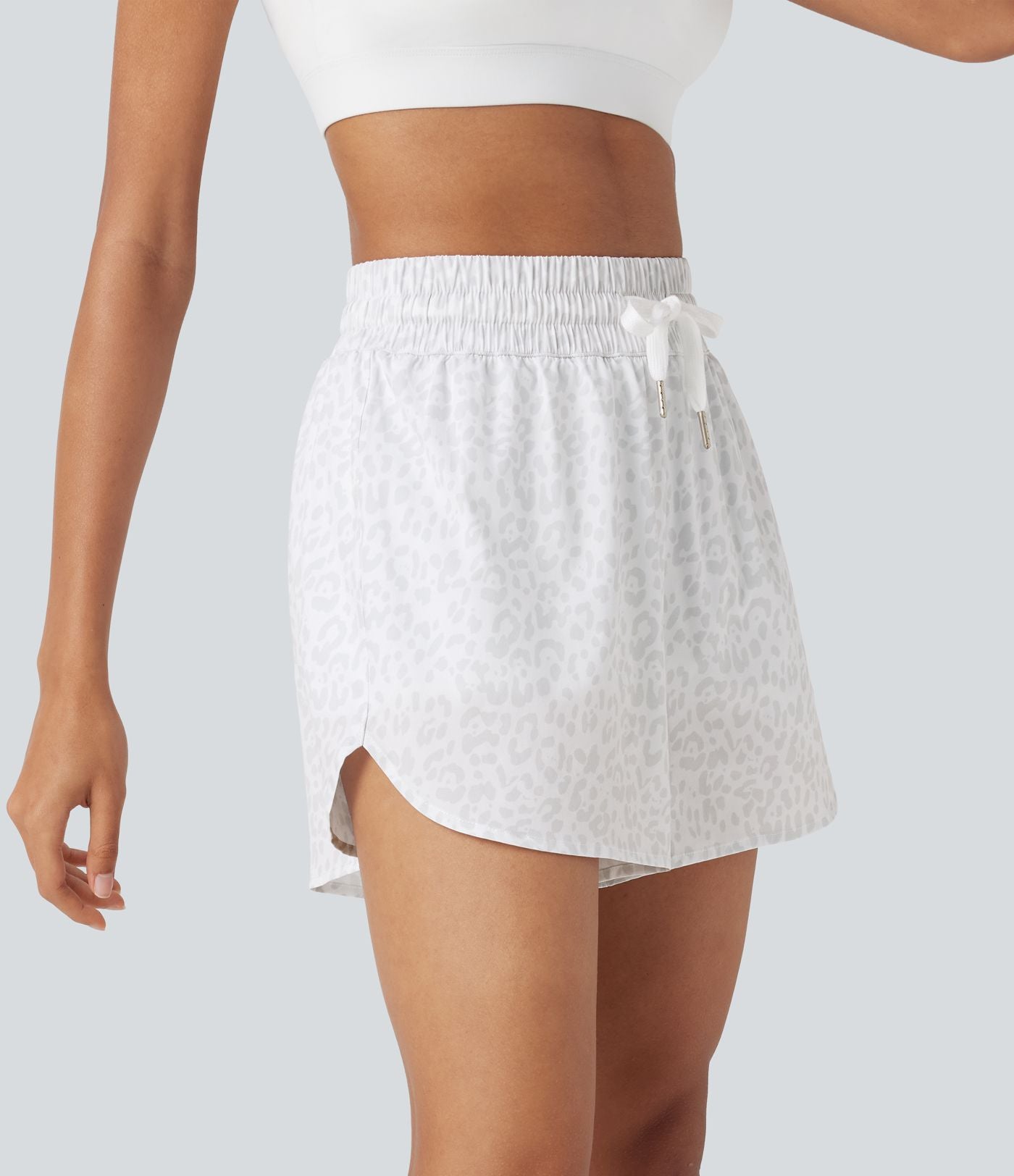 Short de jogging 2-en-1 taille haute avec cordon à imprimé léopard et ourlet incurvé avec poches