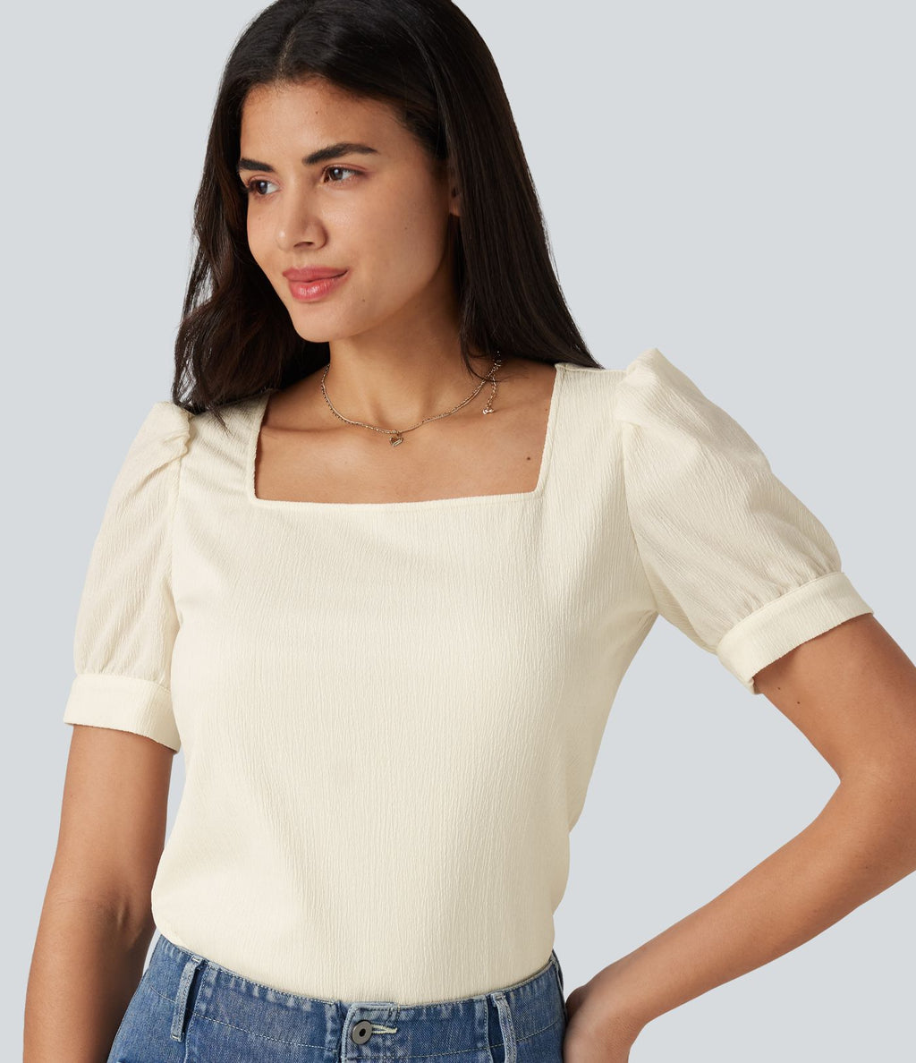 Blouse habillée col carré à manches bouffantes et tissu texturé