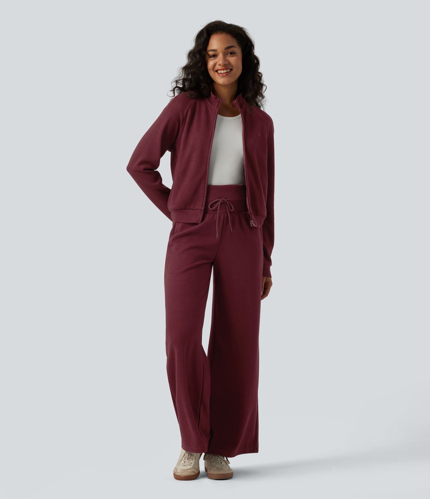 Veste casual côtelée à col montant, manches longues et fermeture zippée avec poches