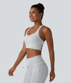 Brassière de sport yoga à rayures dos nageur croisé maintien léger avec soutien-gorge intégré