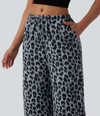 Pantalon large casual en maille gaufrée imprimé léopard taille mi-haute avec cordon de serrage et poches